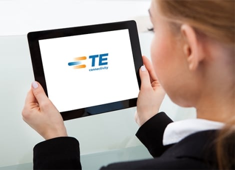 Woman watching a TE Connectivity video.