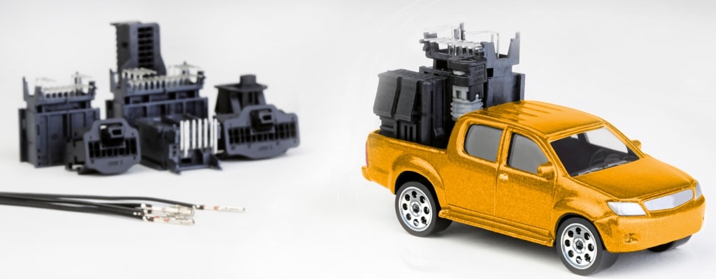 Toy car with miniature connectors
