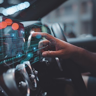 A man operates the software powering a car