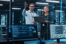 Data engineers discuss power needs for a data center to run AI technologies.