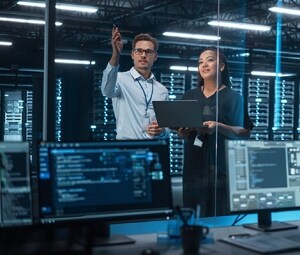 Data engineers discuss power needs for a data center to run AI technologies.