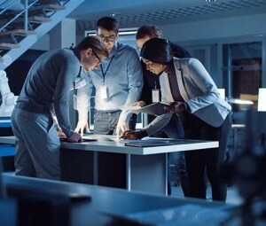 Engineers developing a design concept for a technological application.