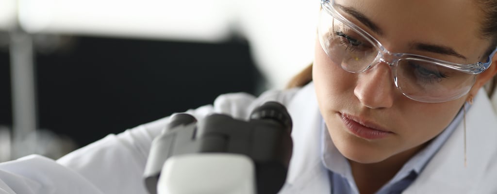 Woman working in a research laboratory on a new material.