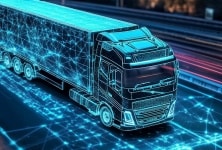 A data-connected smart truck on a highway at night.