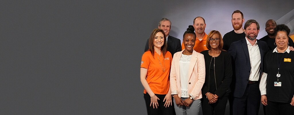 CEO Terrence Curtin with TE employees.