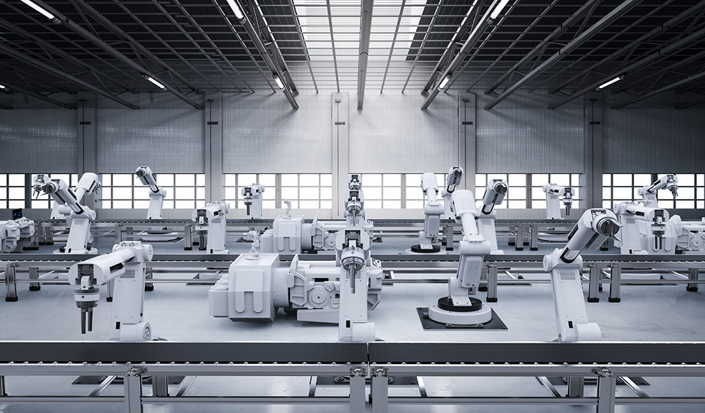 Factory machines run automated processes with connectivity solutions.