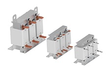 Three industrial 3-phase input chokes or reactors of varying sizes with copper terminals and white coils