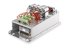An industrial LCL filter unit showing green resistors, silver capacitors, and red wiring