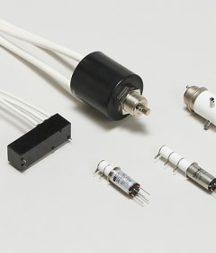 コイル電圧および温度補償