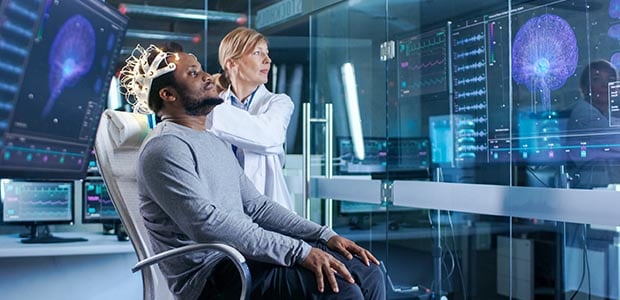 A doctor uses advanced imaging technology to examine a patient.