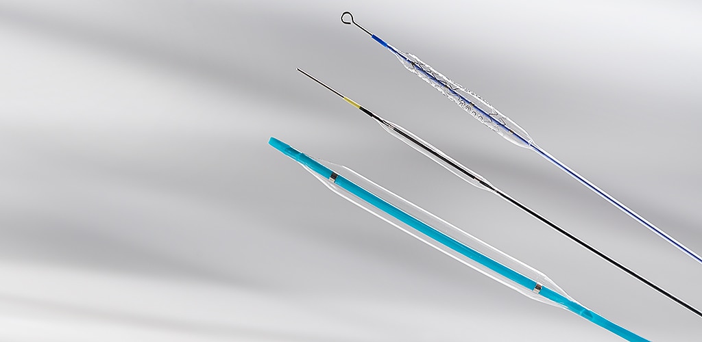 Inserção de enxerto de stent AAA/TAA